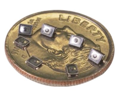 Littelfuse — NanoT Series Tact Switches with coin for scale